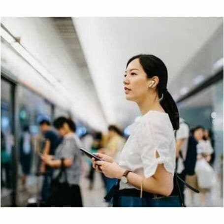 Poly Voyager Free 60 UC earbuds with BT700 USB-C adapter and basic charge case in White Sand